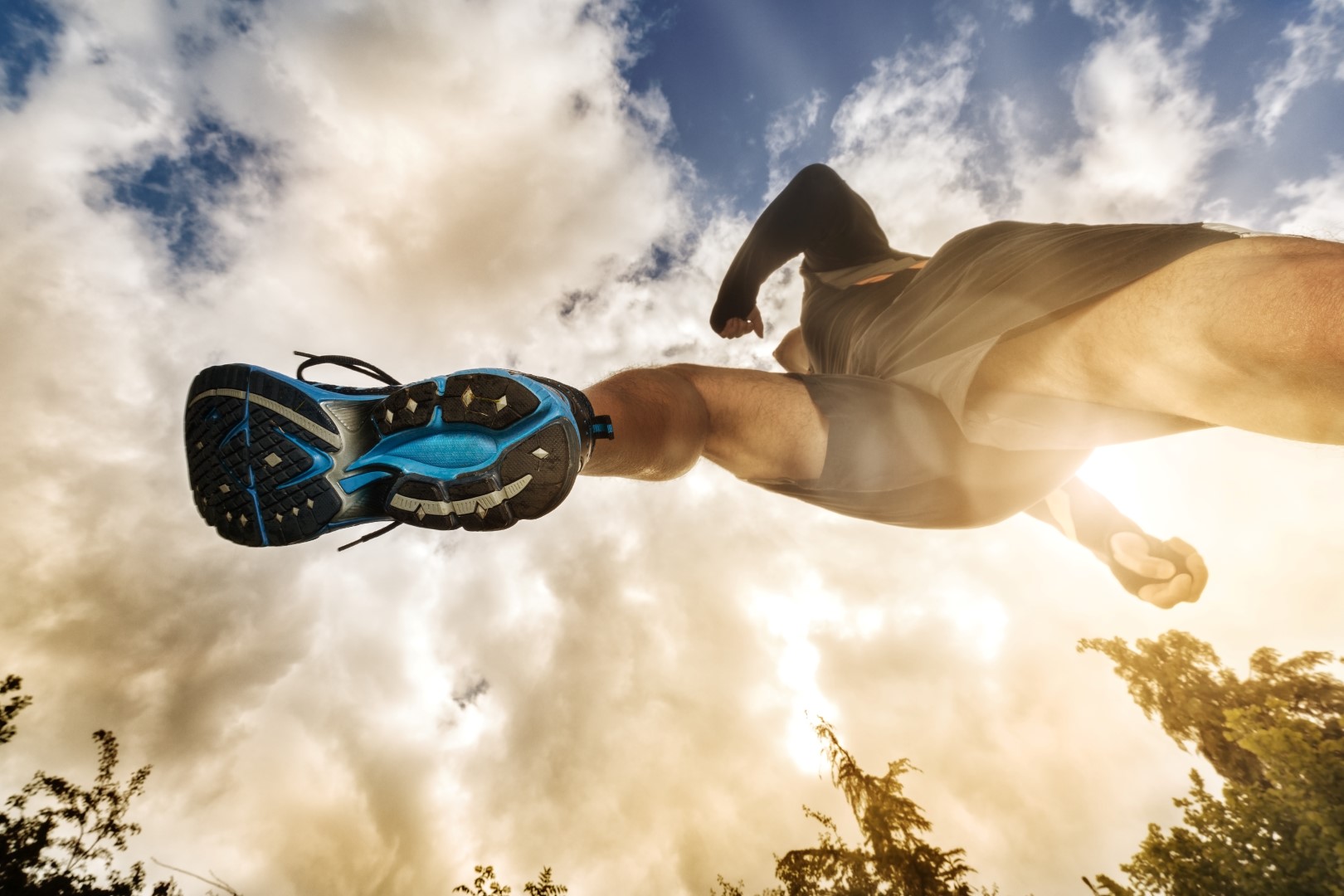 Man_stepping_over_ground_seen_from_below